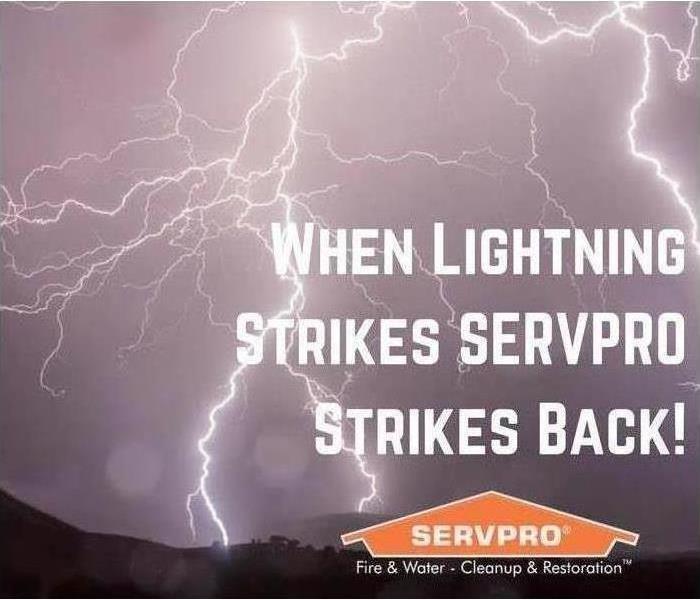 A dark sky with multiple lighting bolts, says when lightning strikes SERVPRO strikes back!
