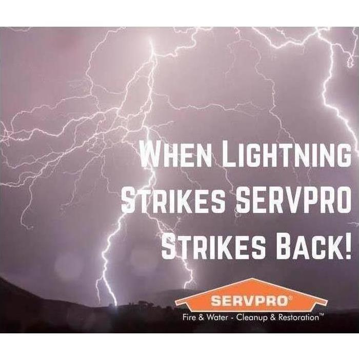 A stormy sky with lightning that says, "when lightning strikes Servpro strikes back!