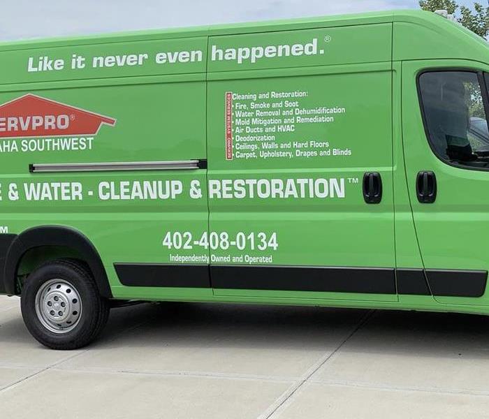 Green van with SERVPRO on the side